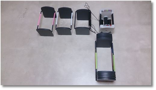 下半分に置いてあるプレートを重ねたブロックダンベル